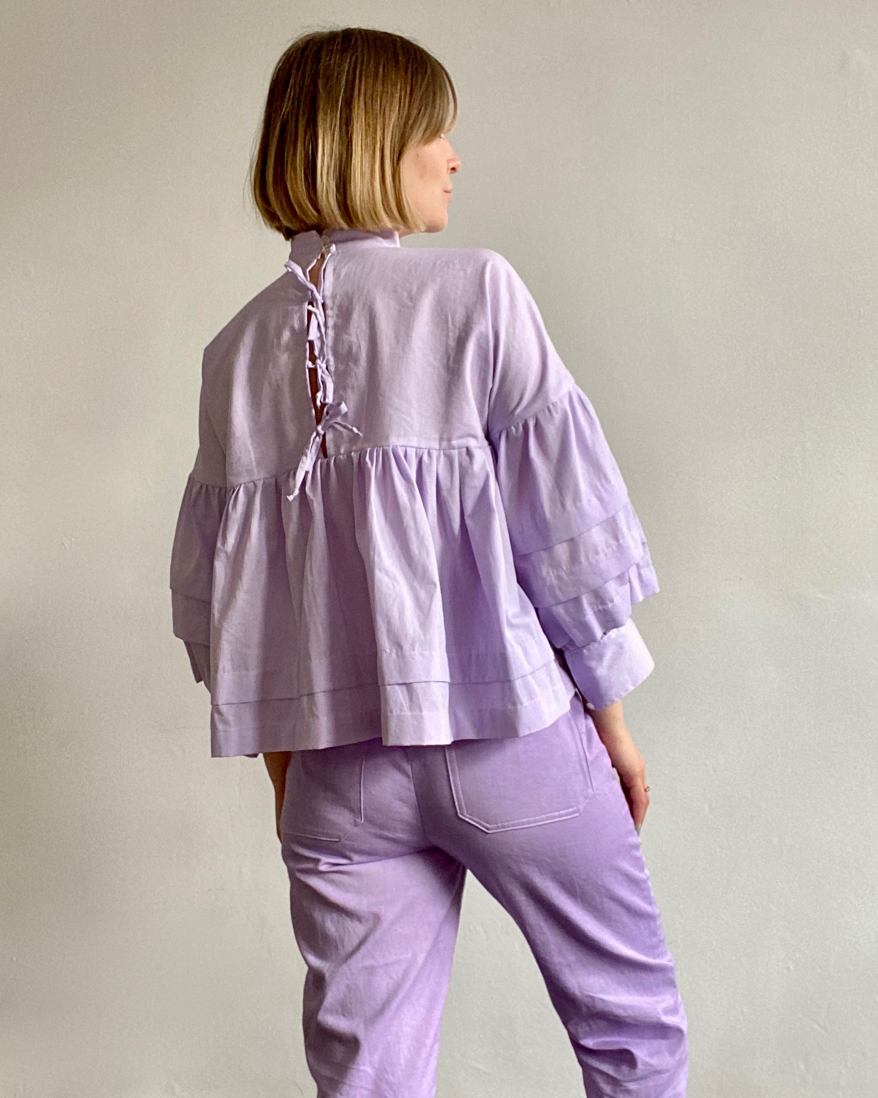 lavender ruffle blouse