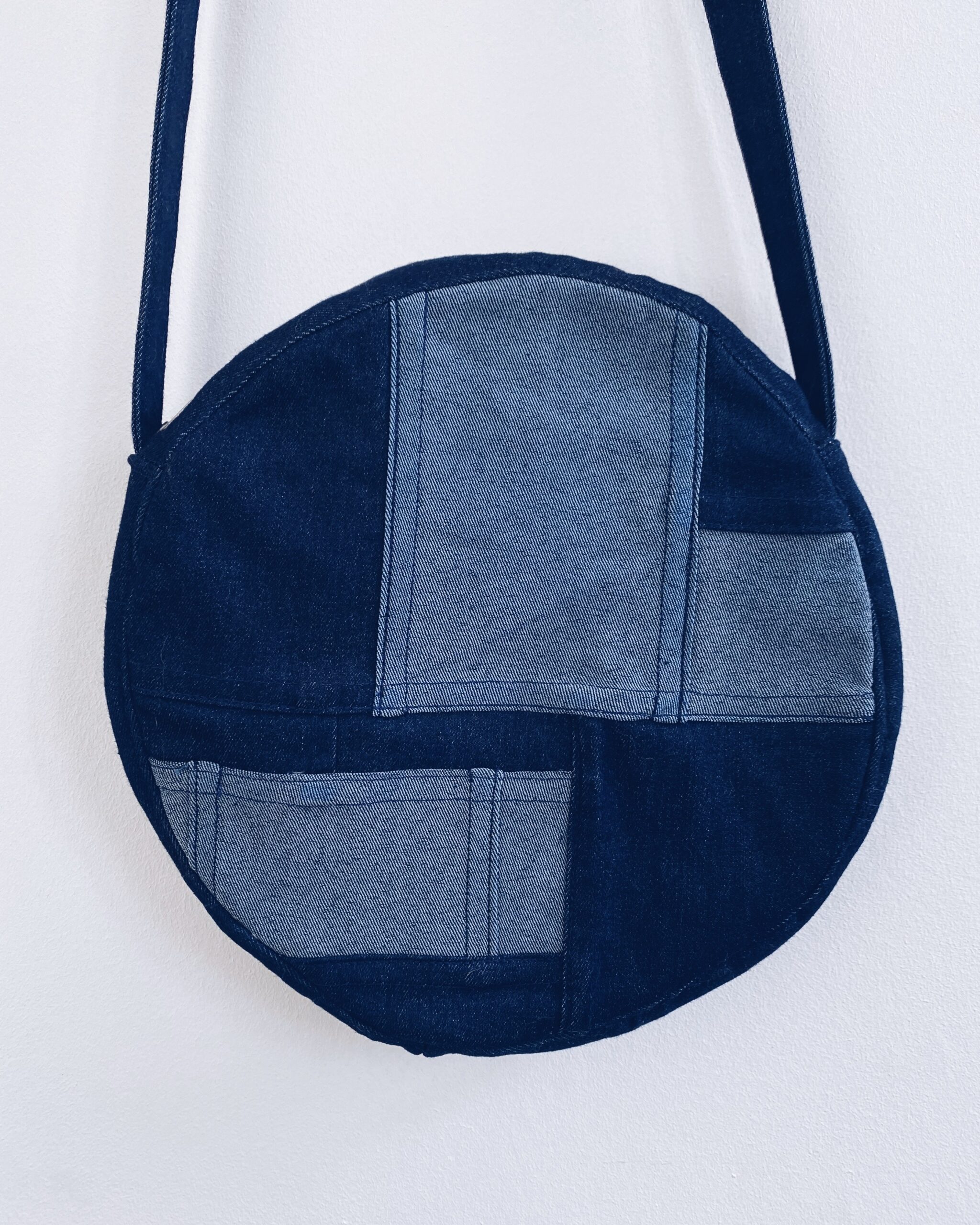 patchwork round denim bag in blue