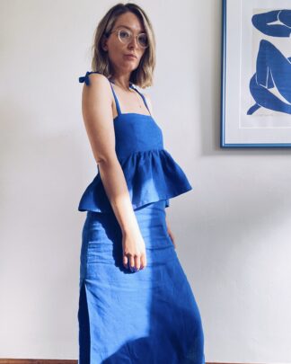 June top in cobalt blue linen with tie straps and a peplum